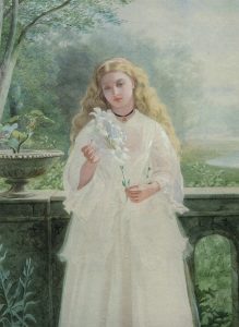 Portrait of a girl holding a lily